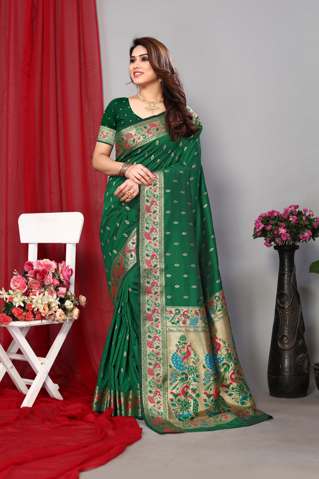 Dark green color paithani silk saree with zari weaving work
