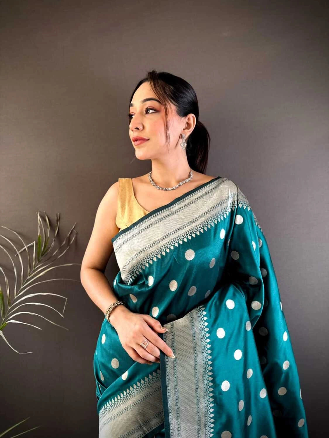 Rama green Nath paithani silk saree with zari weaving work