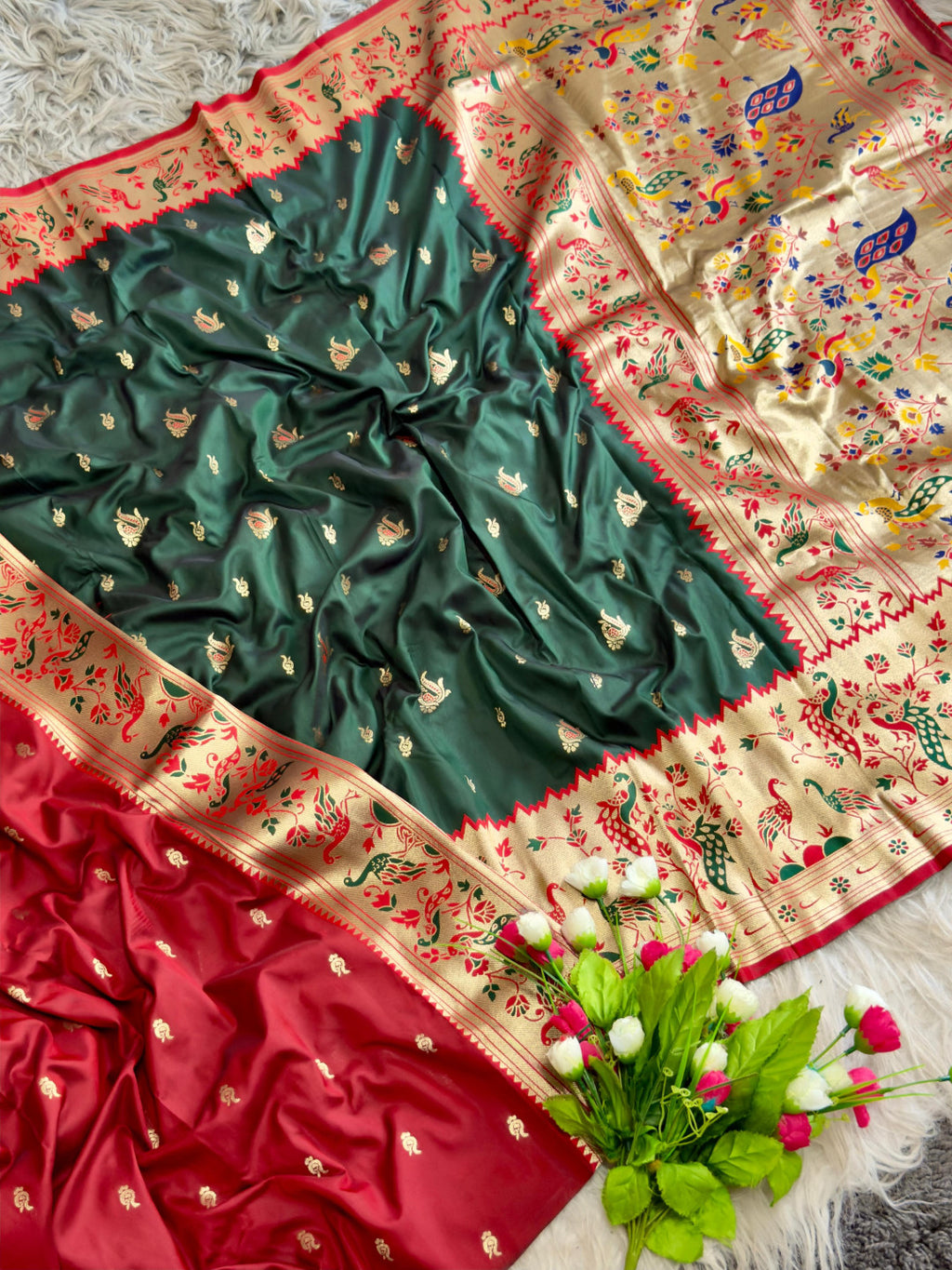 Dark green traditional paithani silk saree with peacock zari weaving work