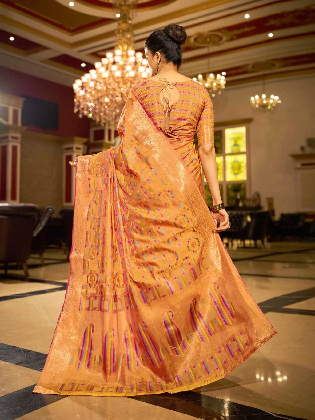 Orange soft organza silk saree with zari weaving work