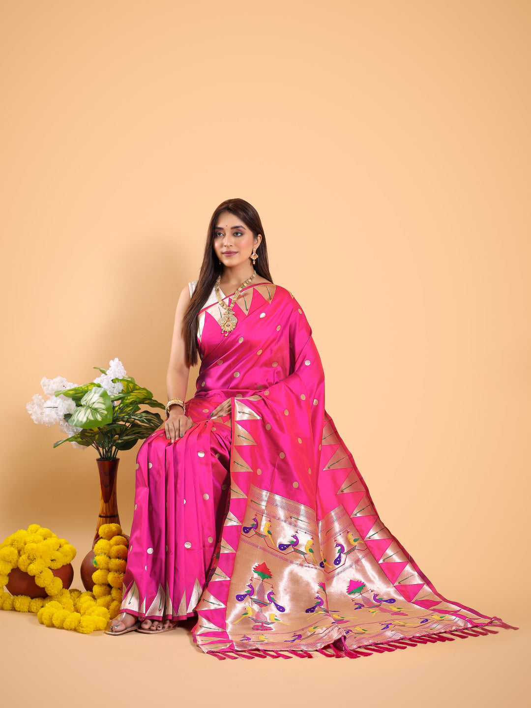 Rani pink color paithani silk saree with zari weaving work
