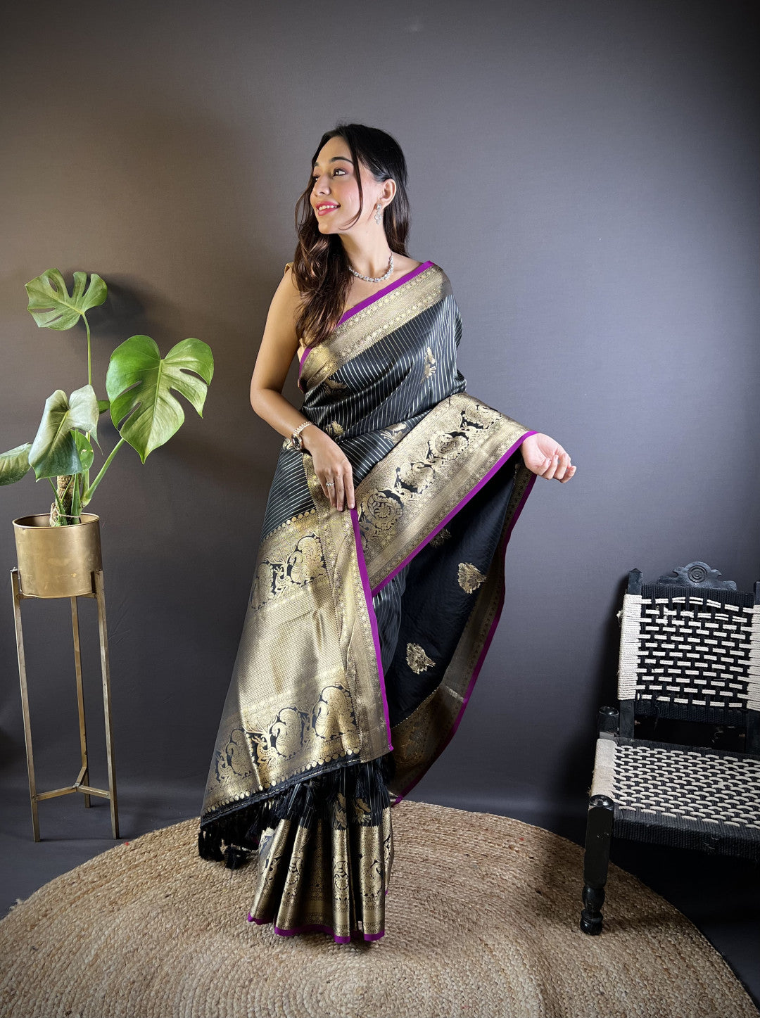 Black kanchipuram silk saree with golden zari weaving work