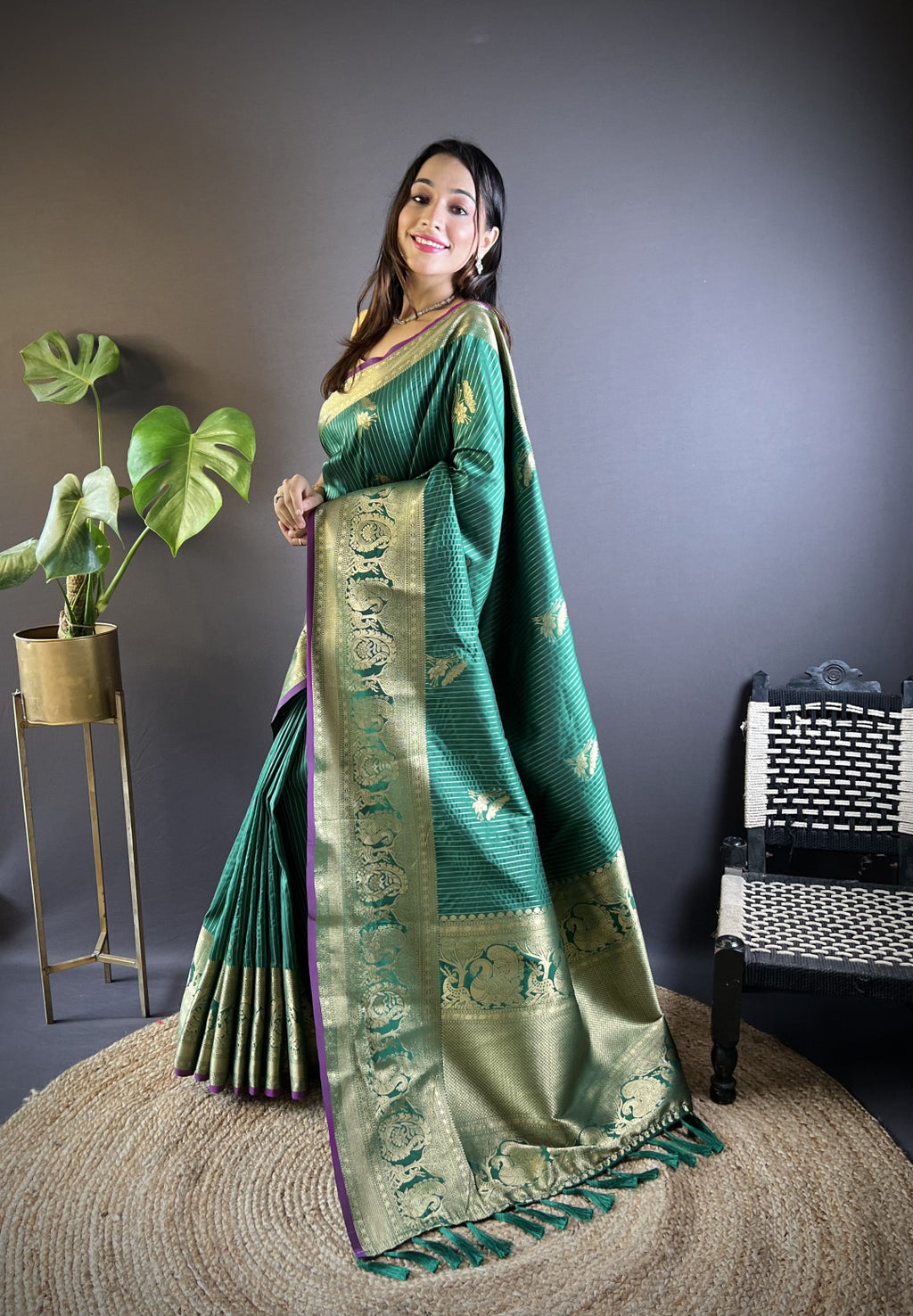 Green kanchipuram silk saree with golden zari weaving work