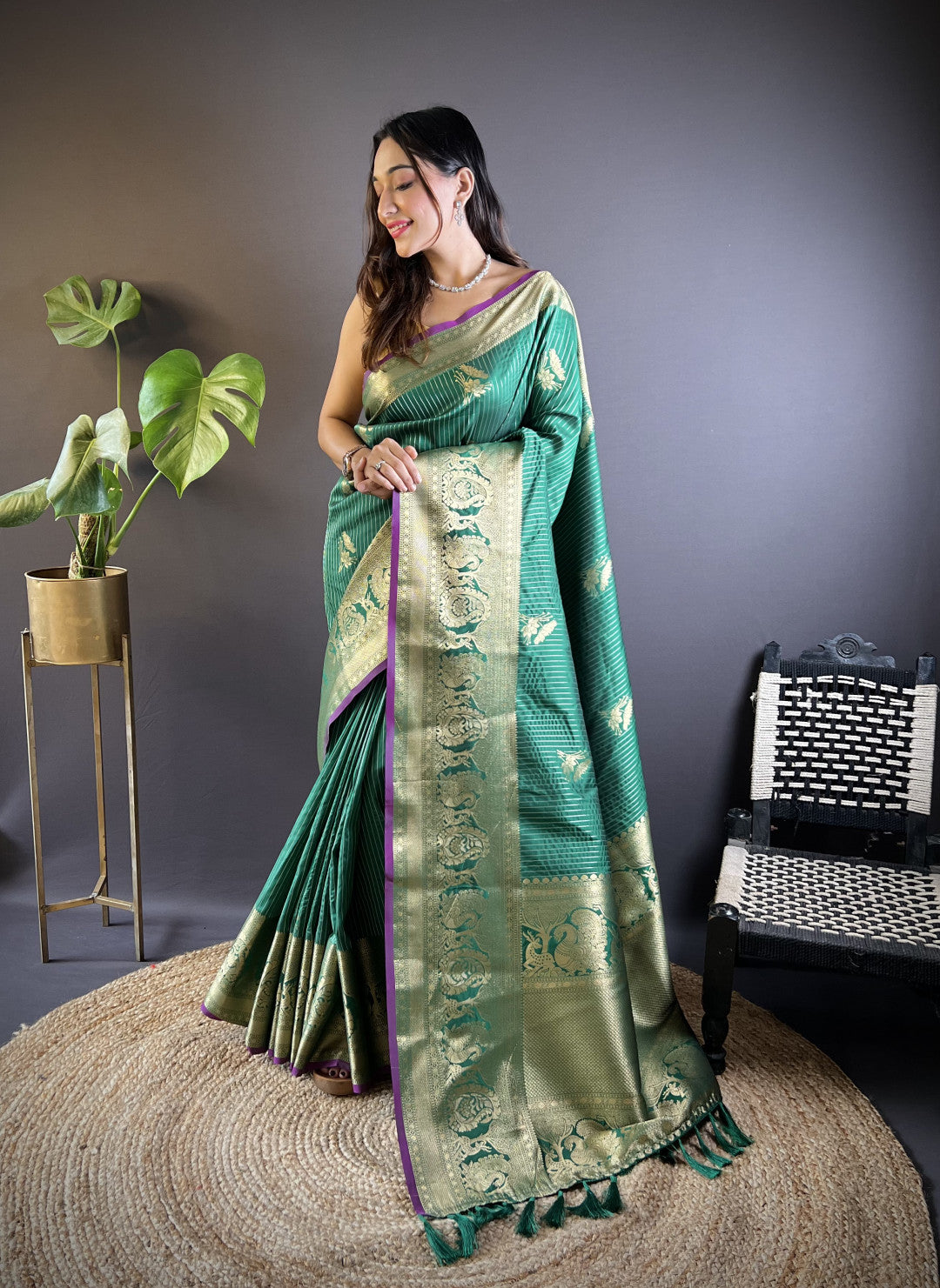 Green kanchipuram silk saree with golden zari weaving work