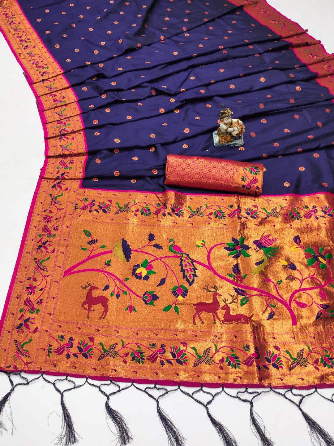 Purple color paithani silk saree with zari weaving work