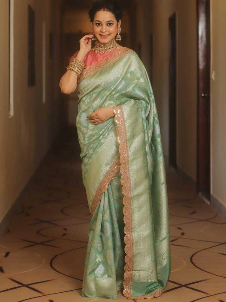 Pista green premium banarasi katan silk saree with zari weaving & lace border