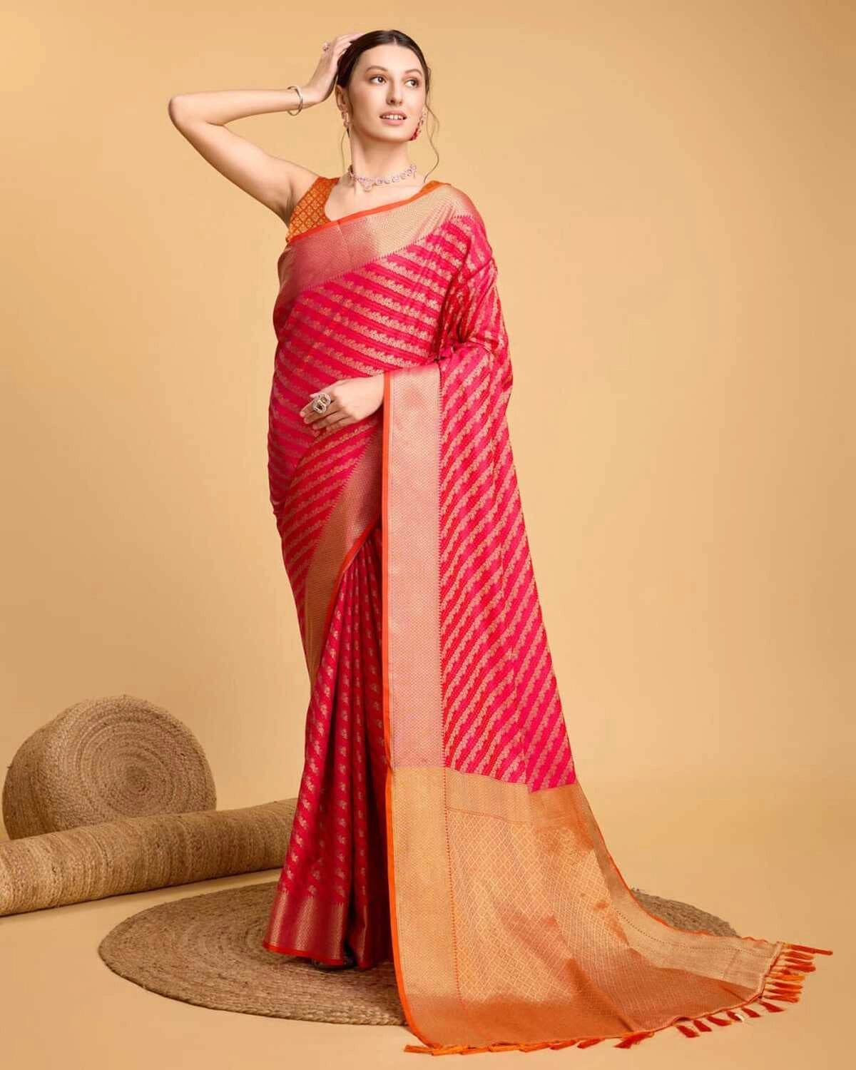 Pink color kanchipuram silk saree with zari woven work