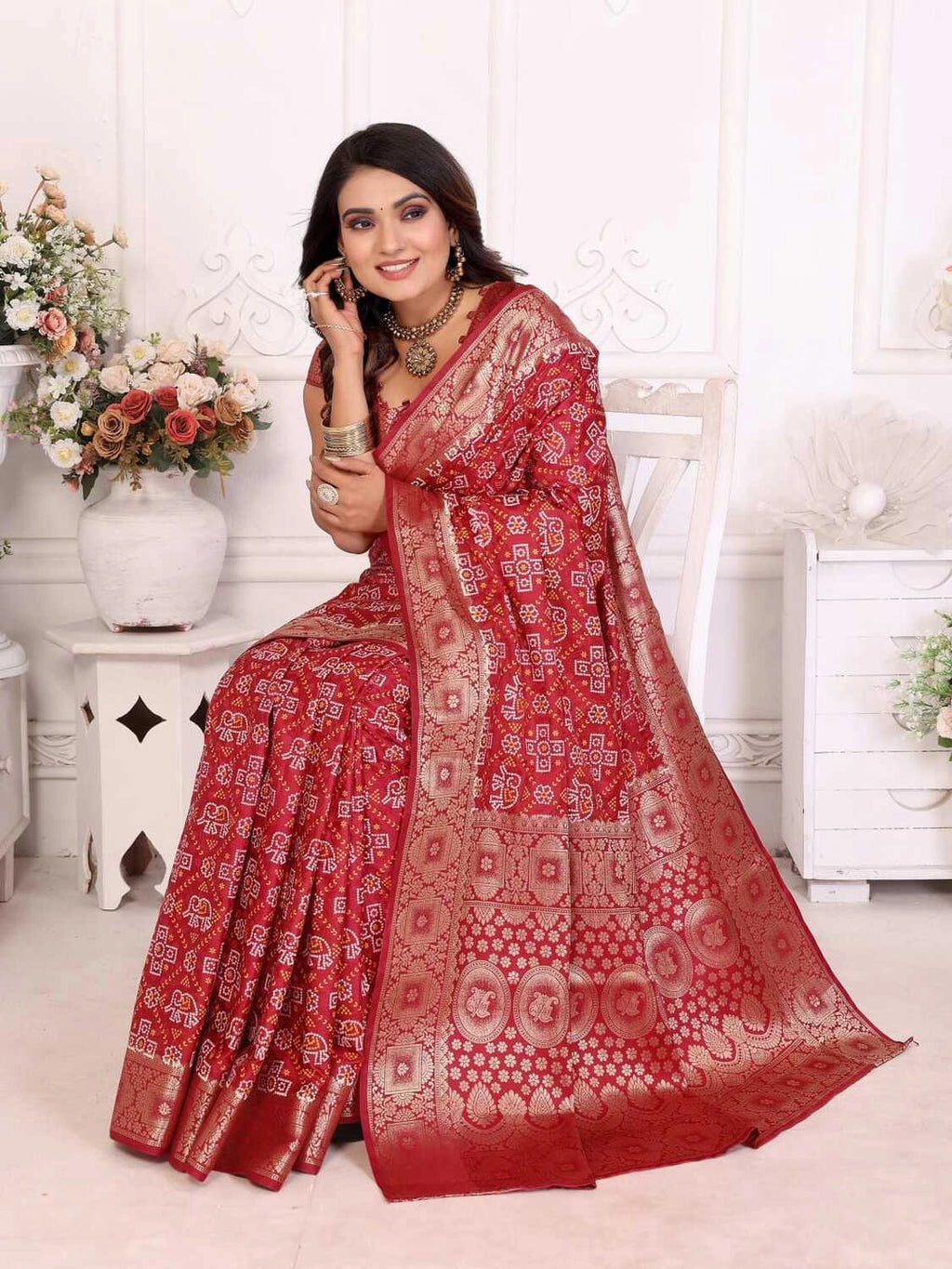 Maroon satin silk bandhej saree with zari weaving border & pallu