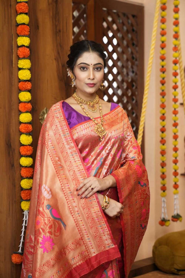 Red color paithani silk saree with zari weaving work
