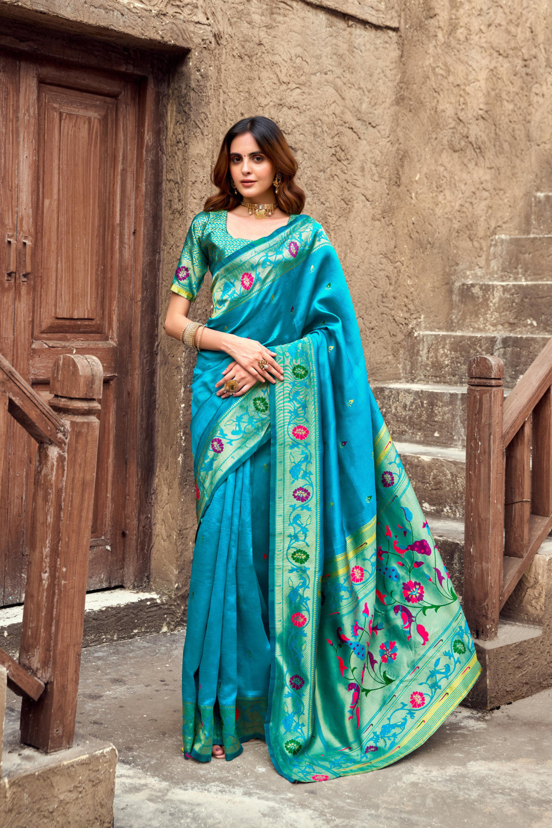 Traditional blue paithani silk saree with zari weaving work