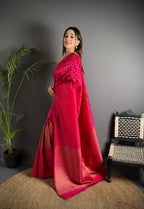Rani pink color banarasi silk saree with zari weaving work