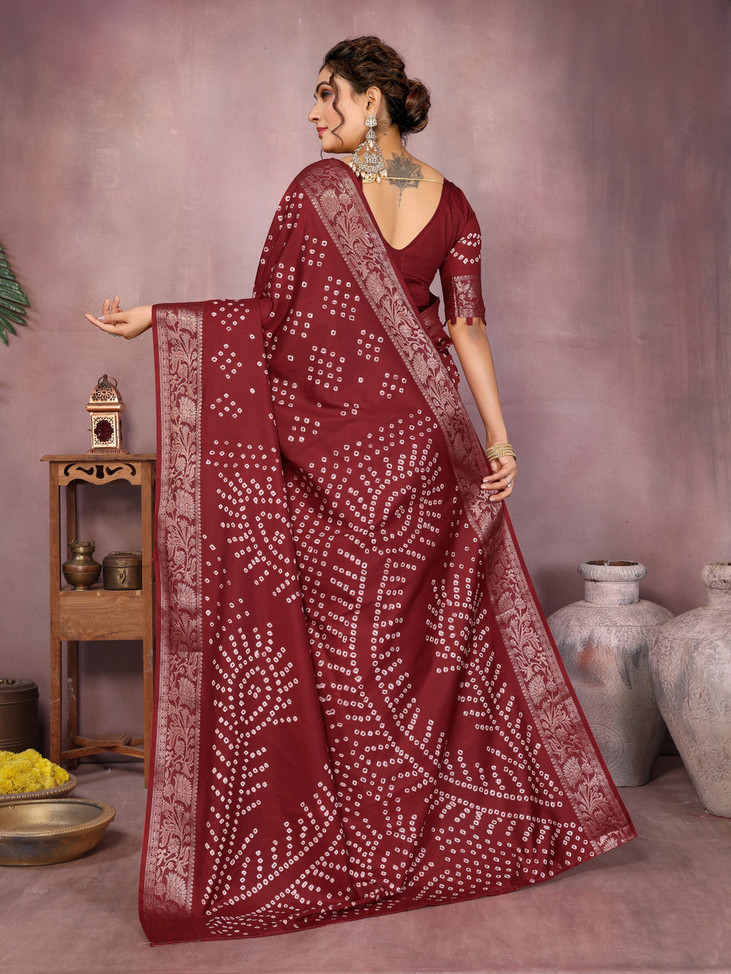 Maroon colour hand bandhej bandhani saree with zari weaving work