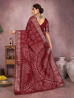 Maroon colour hand bandhej bandhani saree with zari weaving work