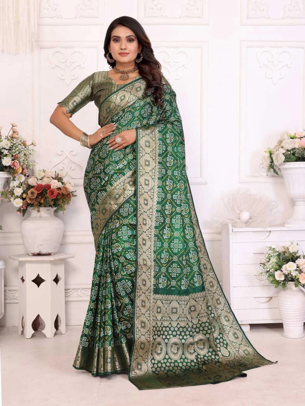 Green satin silk bandhej saree with zari weaving border & pallu