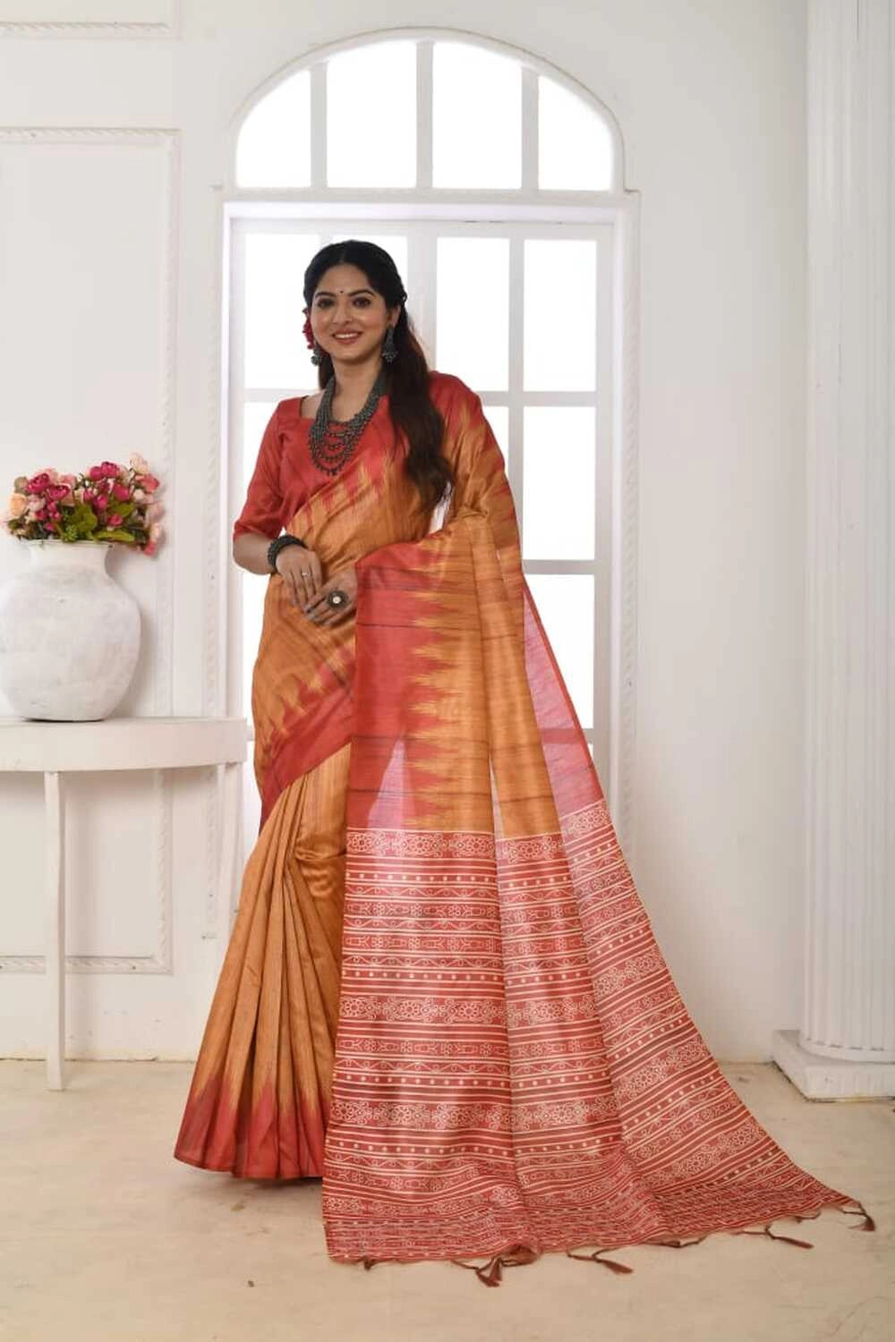 Mustard yellow color tussar silk saree with printed work