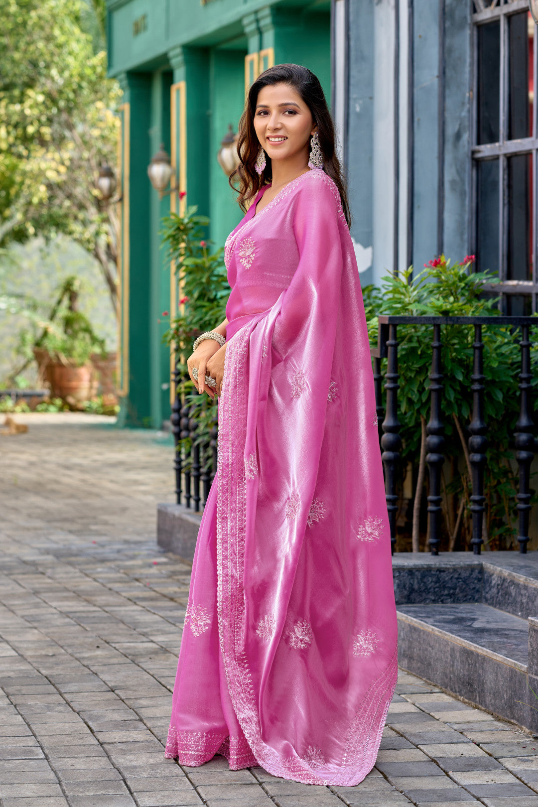 Baby pink fancy shimmer chiffon saree with embroidery work