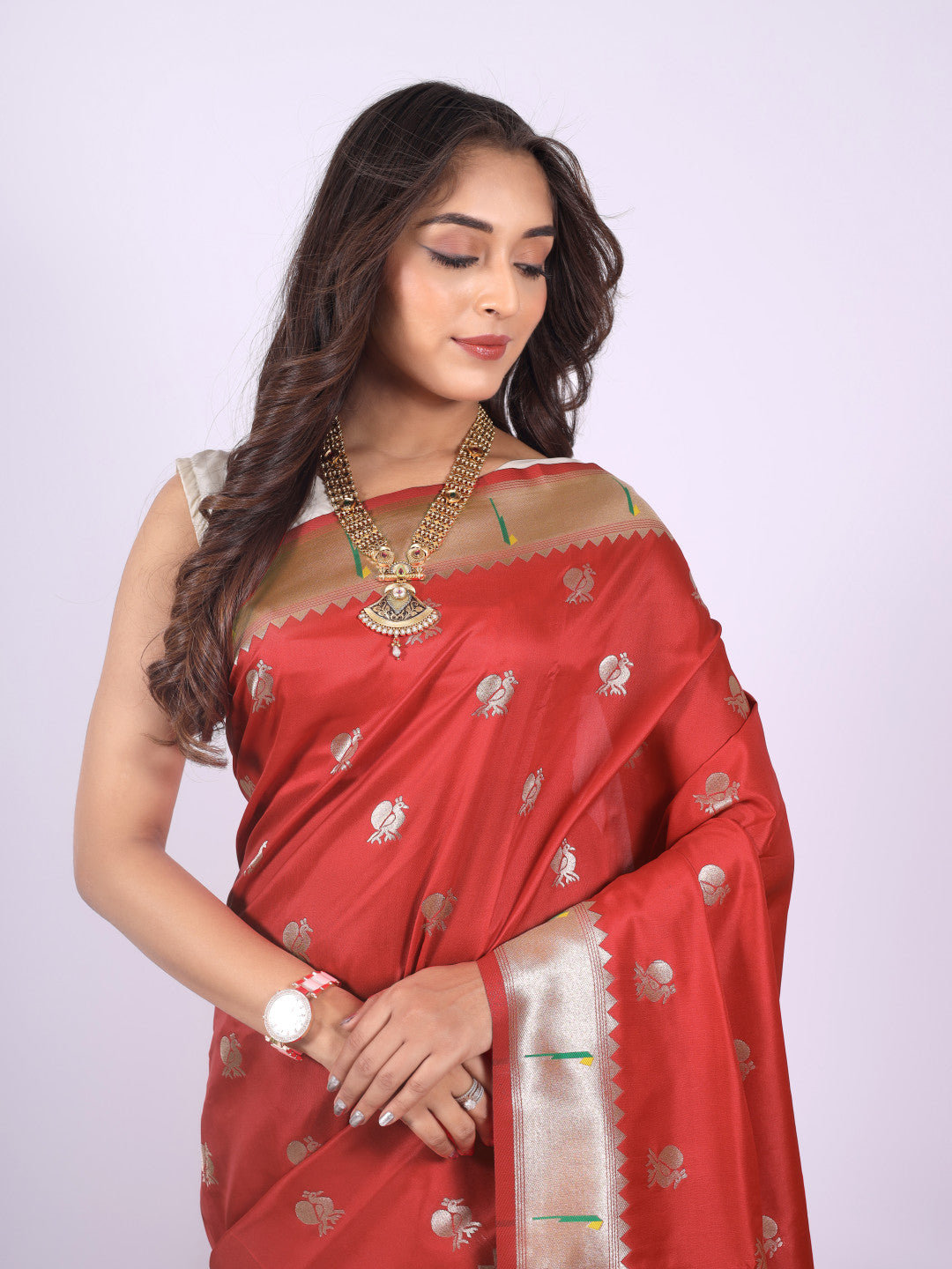 Red color paithani silk saree with zari weaving work