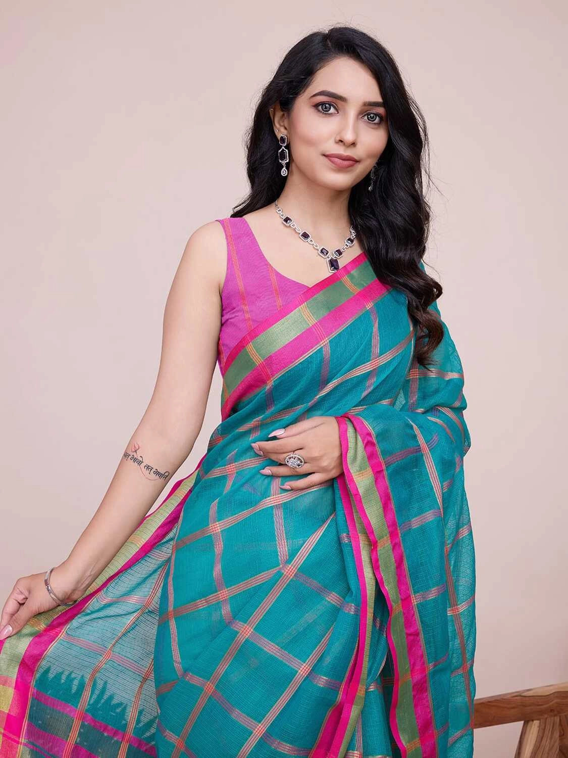 Sea green kota doriya saree with zari weaving work