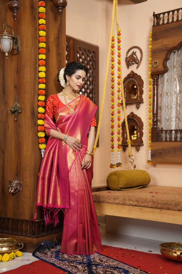 Pink color kanjivaram silk saree with zari weaving work