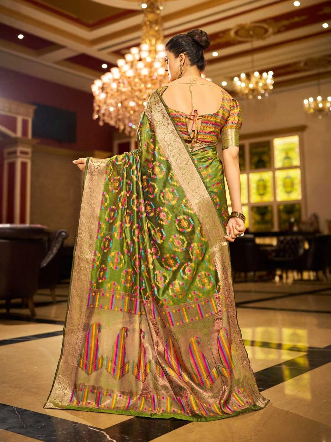 Mahendi green soft organza silk saree with zari weaving work