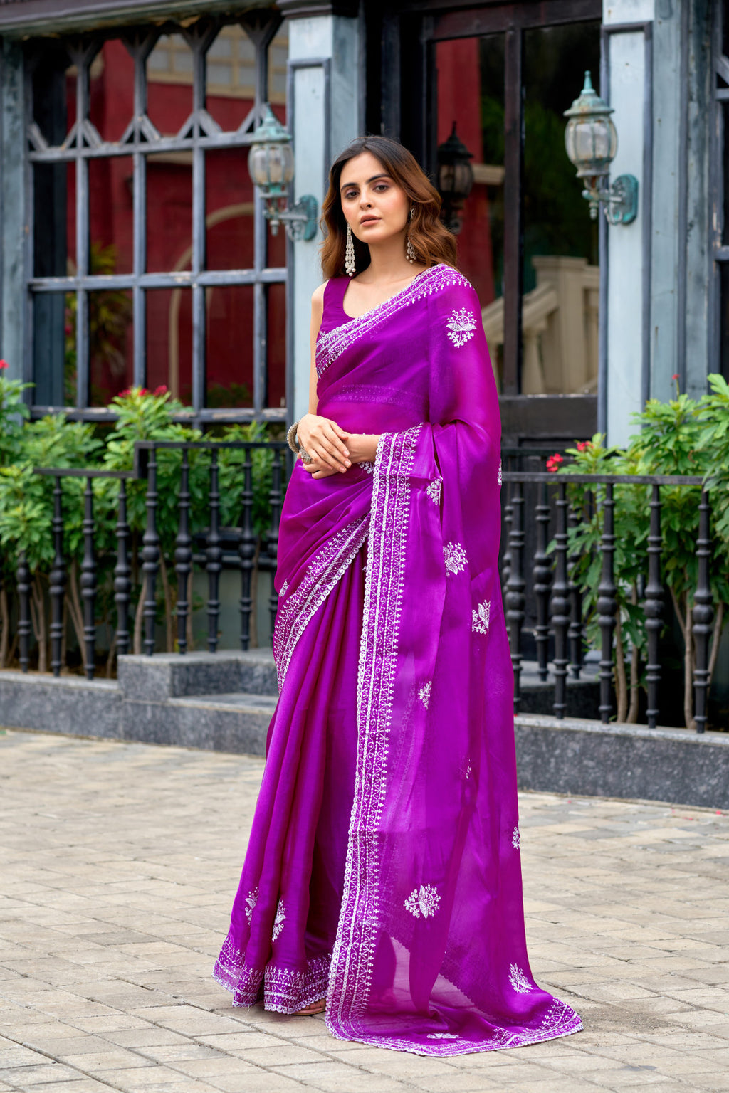 Magenta fancy shimmer chiffon saree with embroidery work