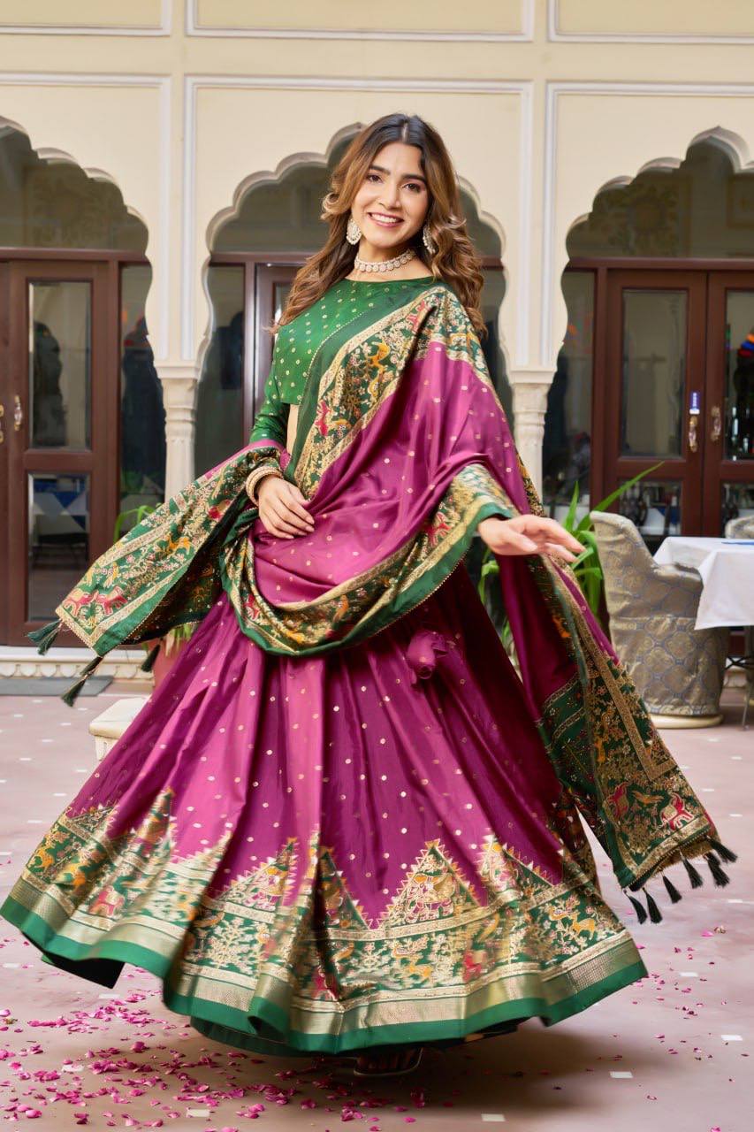 Magenta and green color dola silk lehenga with patola printed work