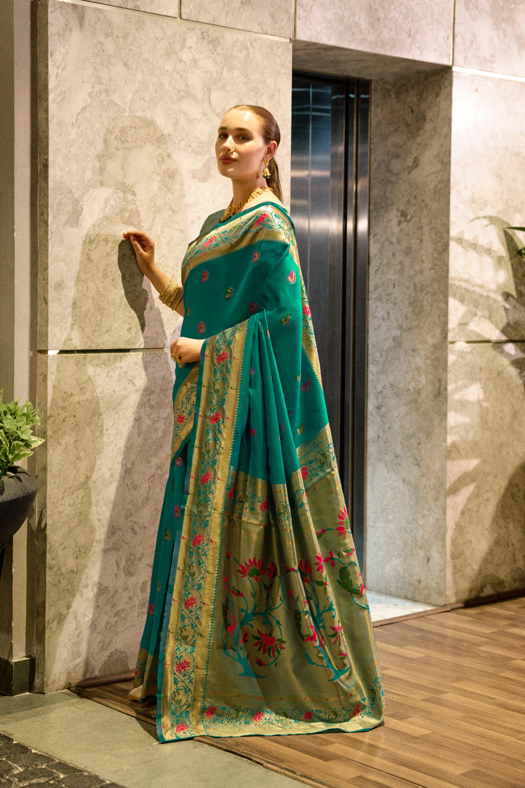 Traditional rama green paithani silk saree with zari weaving work