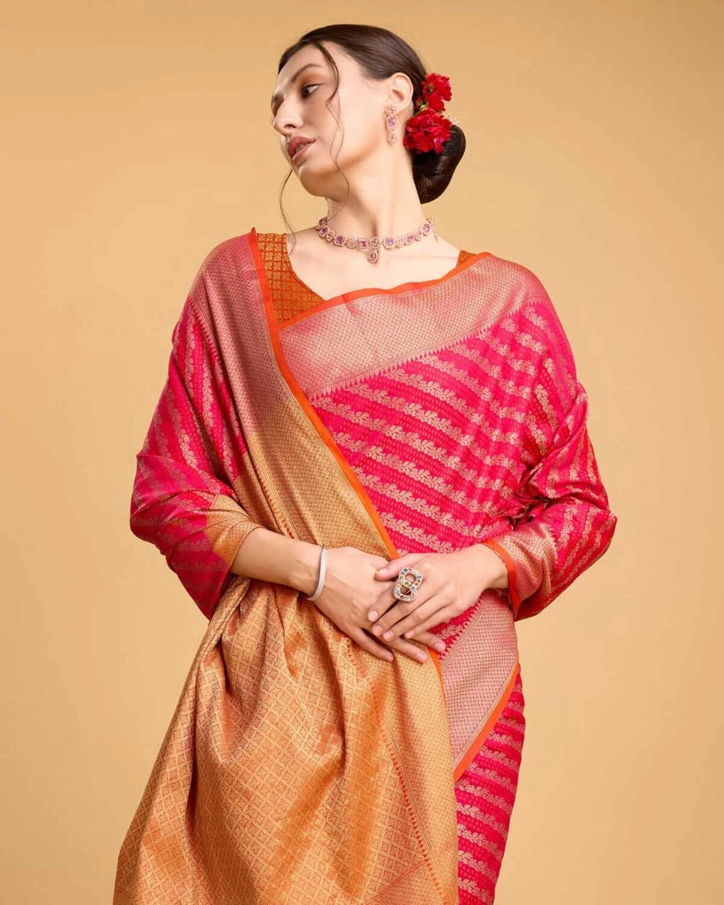 Pink color kanchipuram silk saree with zari woven work
