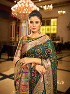 Green soft organza silk saree with zari weaving work