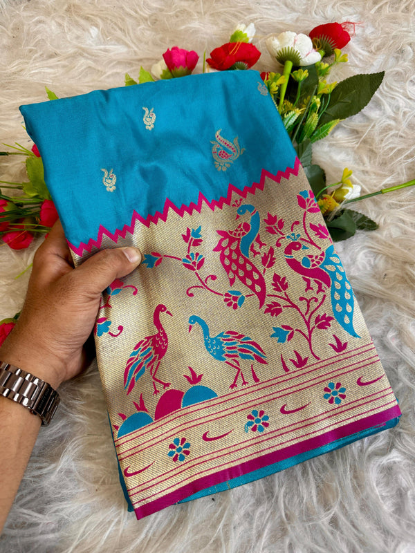 Sky blue traditional paithani silk saree with peacock zari weaving work
