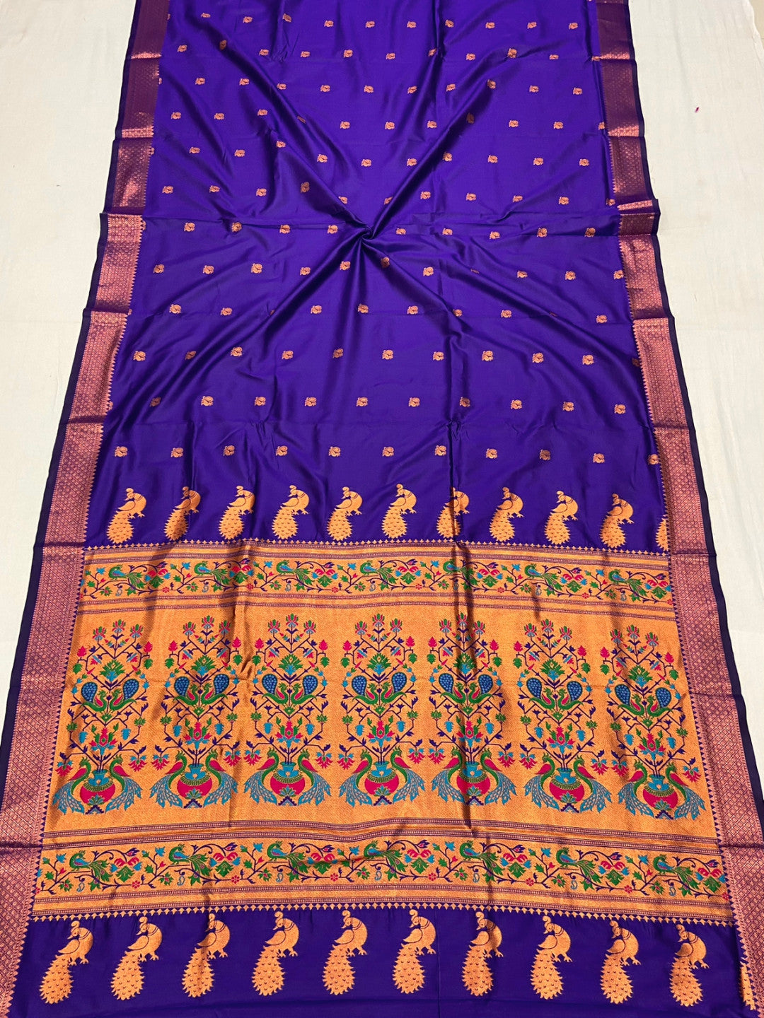 Violet color paithani silk saree with zari weaving work
