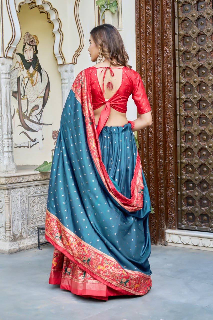 Firoji and red color dola silk lehenga with patola printed work