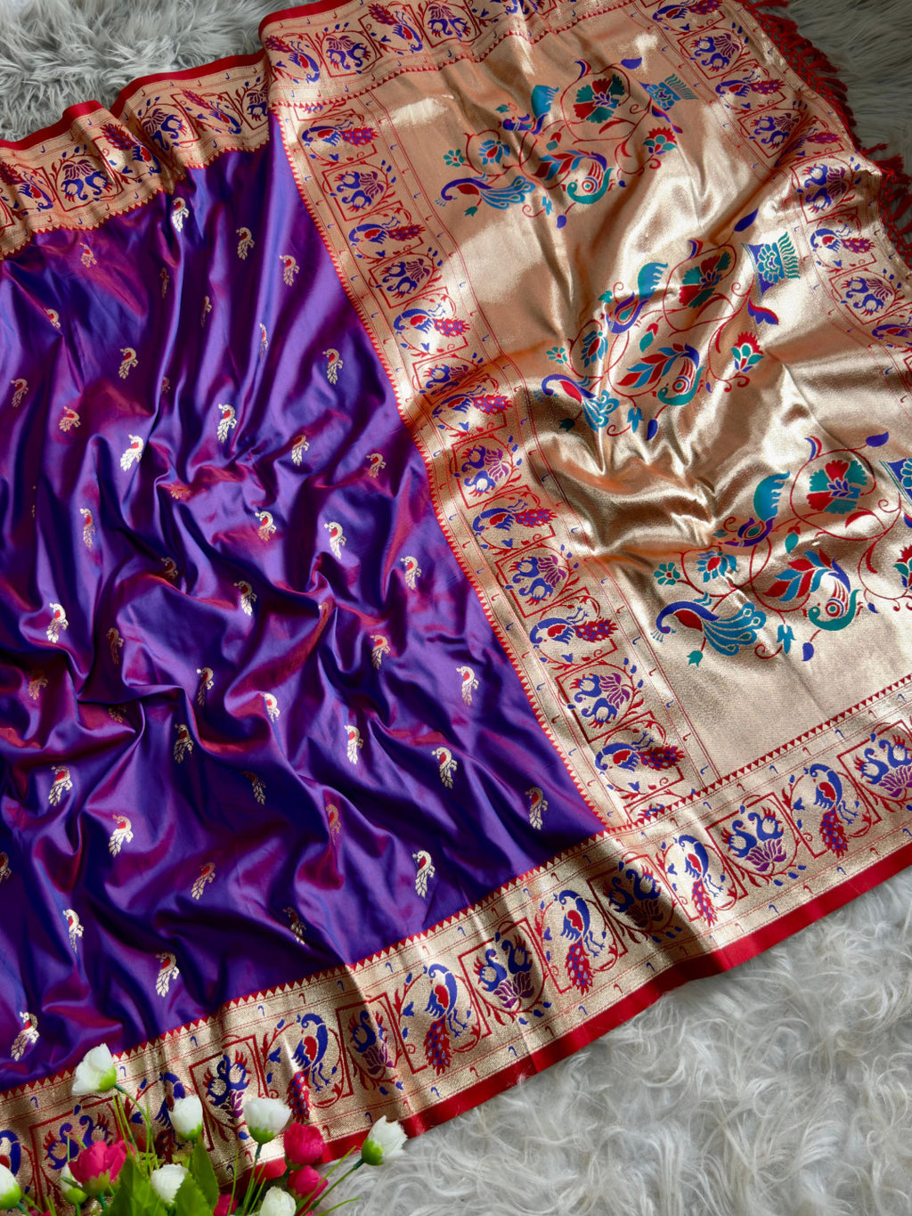 Purple traditional paithani silk saree with peacock zari weaving work
