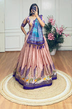 Peach and blue color dola silk lehenga with foil and patola printed work