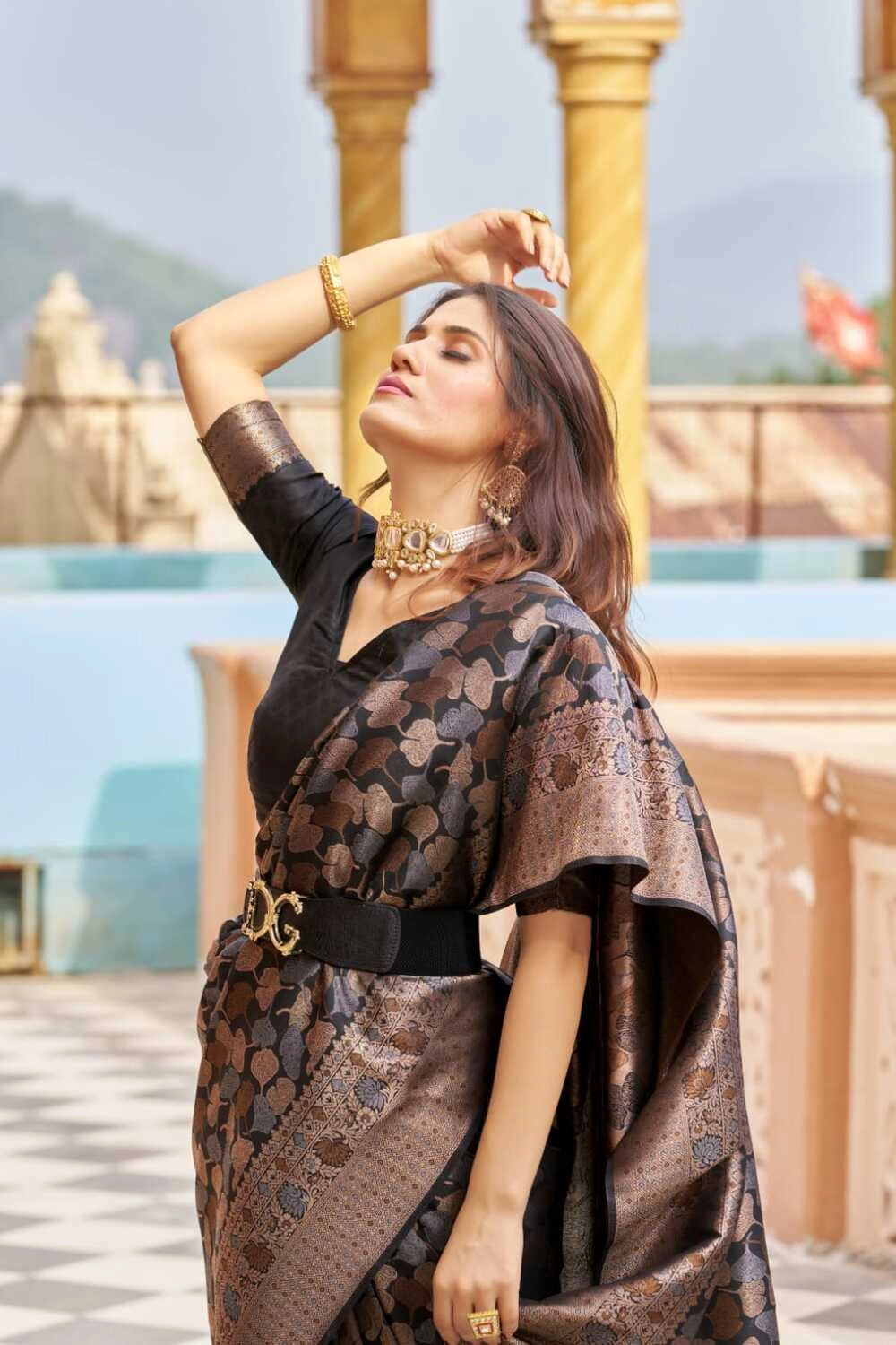 Black color kanjivaram silk saree with zari weaving work