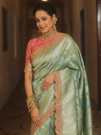 Pista green premium banarasi katan silk saree with zari weaving & lace border