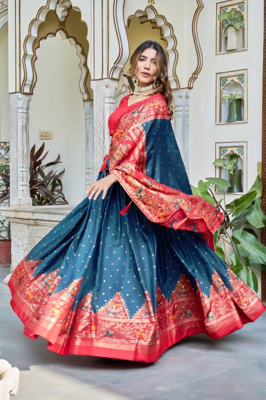 Firoji and red color dola silk lehenga with patola printed work