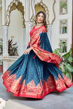 Firoji and red color dola silk lehenga with patola printed work