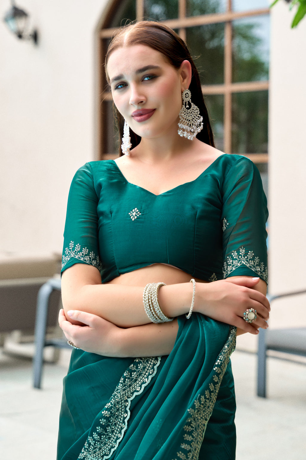 Dark green fancy shimmer chiffon saree with embroidery work