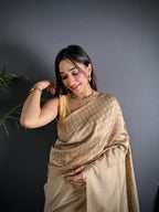 Beige color banarasi silk saree with zari weaving work