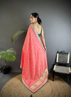 Peach traditional blooming vichitra khadi bandhej silk saree with sequence work