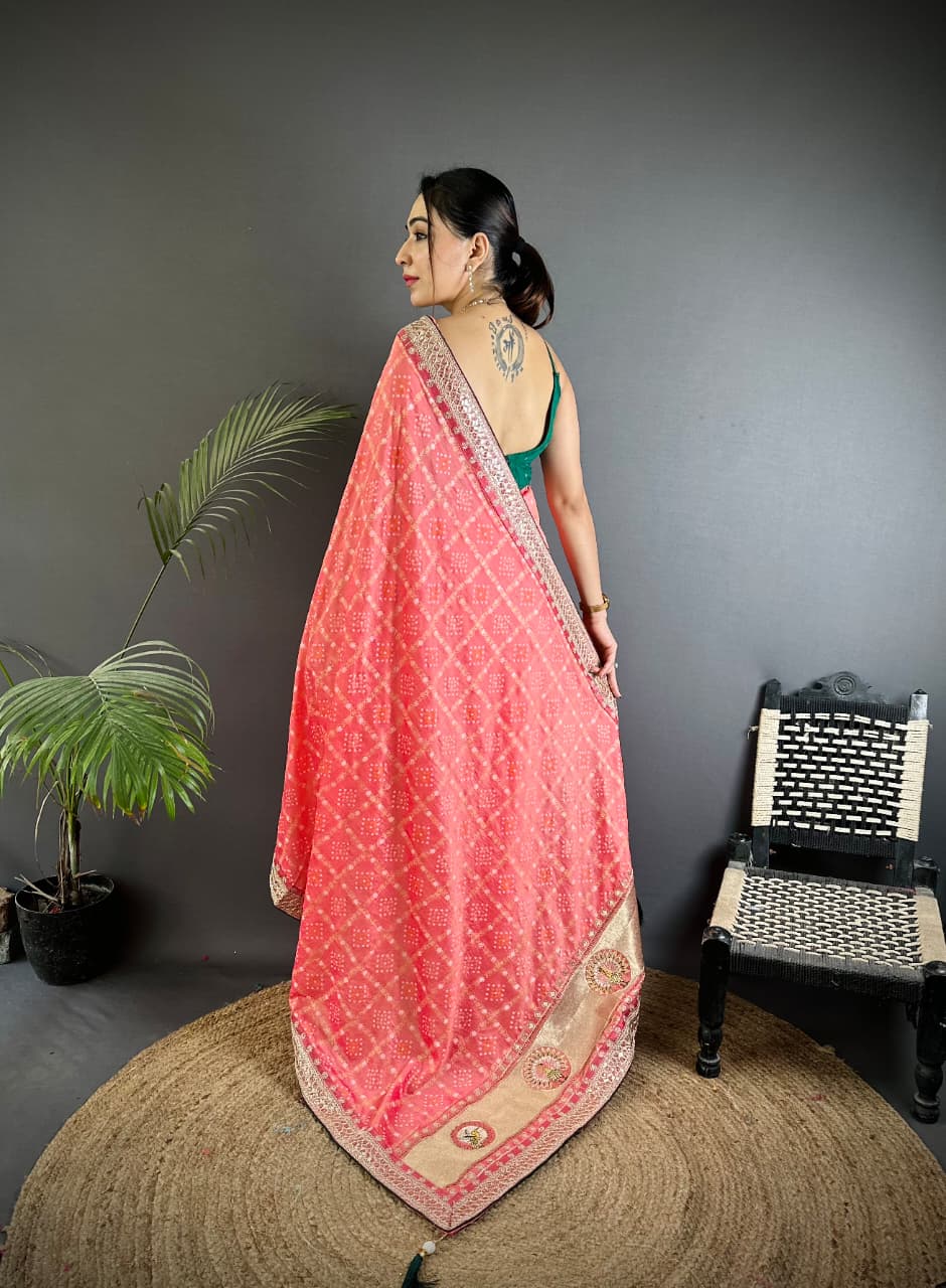 Peach traditional blooming vichitra khadi bandhej silk saree with sequence work