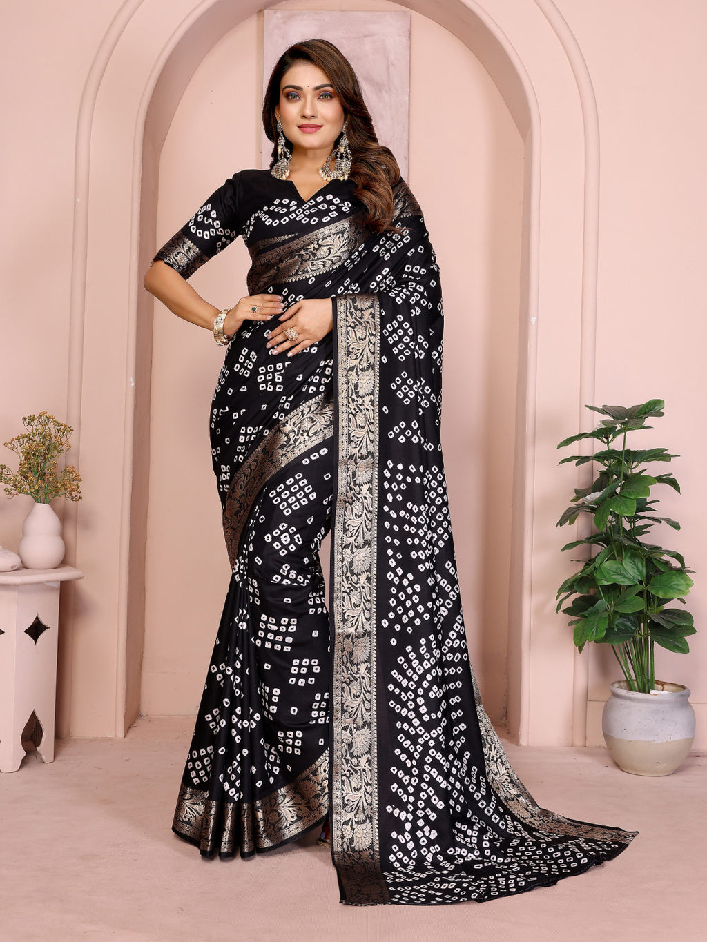 Black colour hand bandhej bandhani saree with zari weaving work