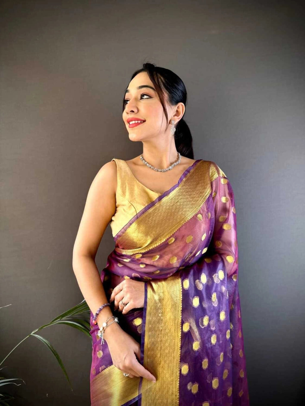 Purple latest organza silk saree with zari weaving work