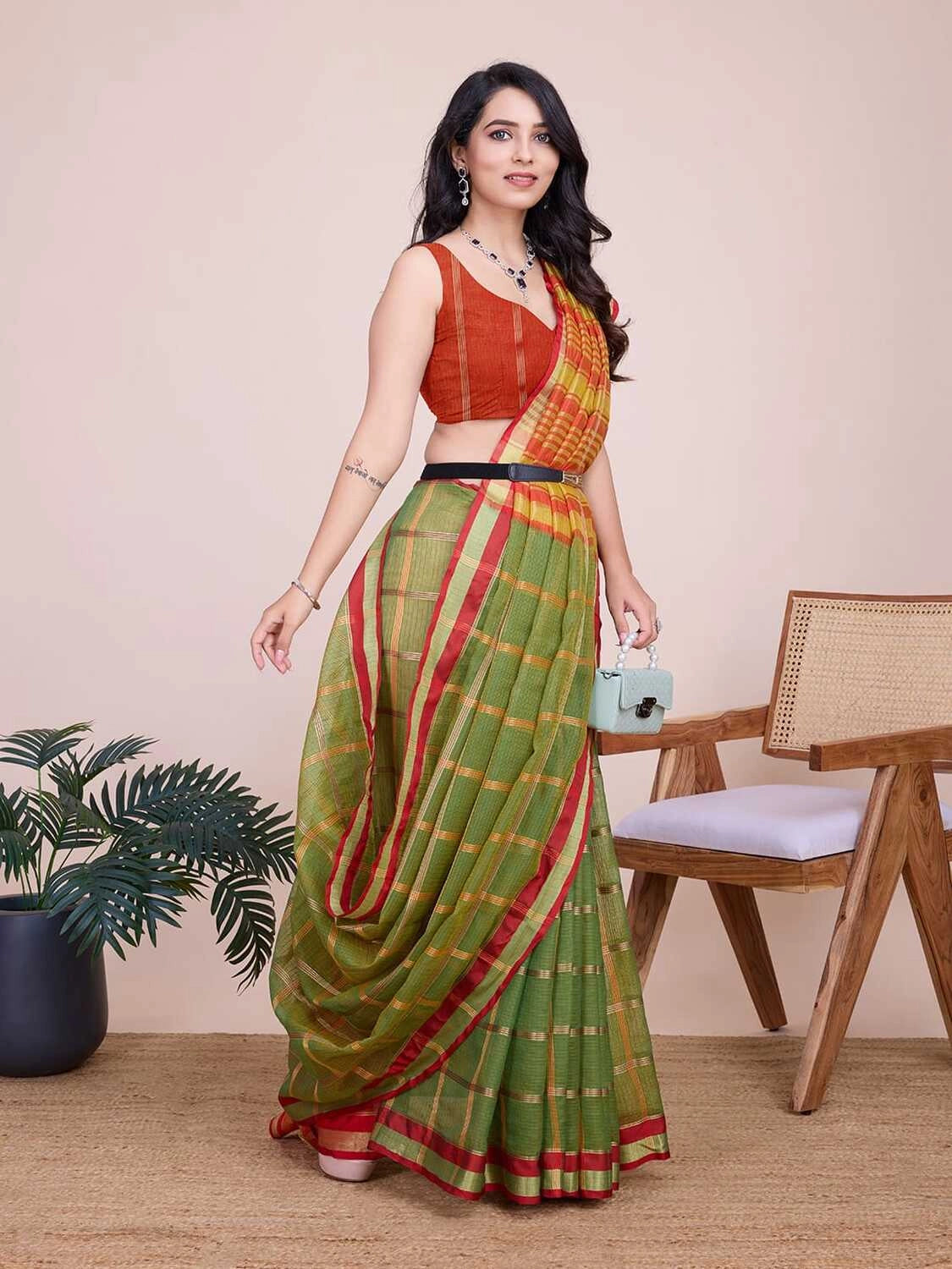 Mahendi green kota doriya saree with zari weaving work