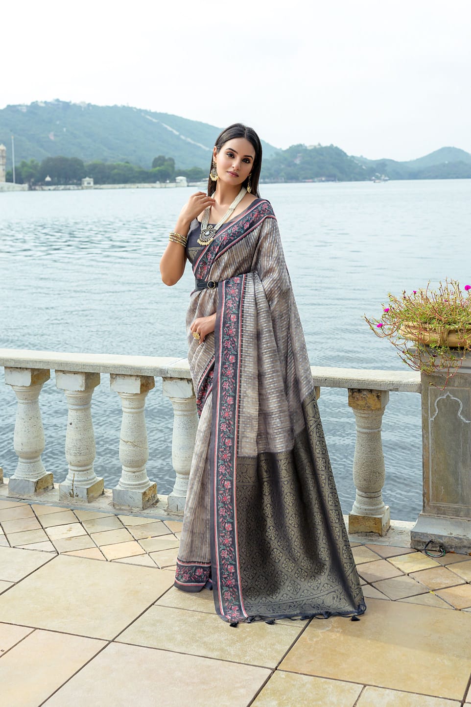 Gray color soft tussar silk saree with zari weaving work