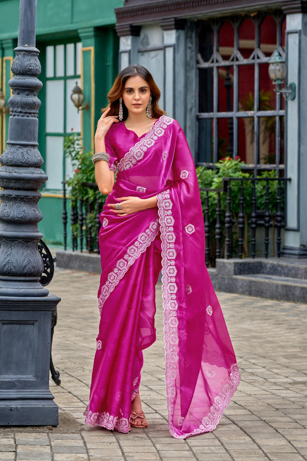 Rani pink fancy shimmer chiffon saree with embroidery work