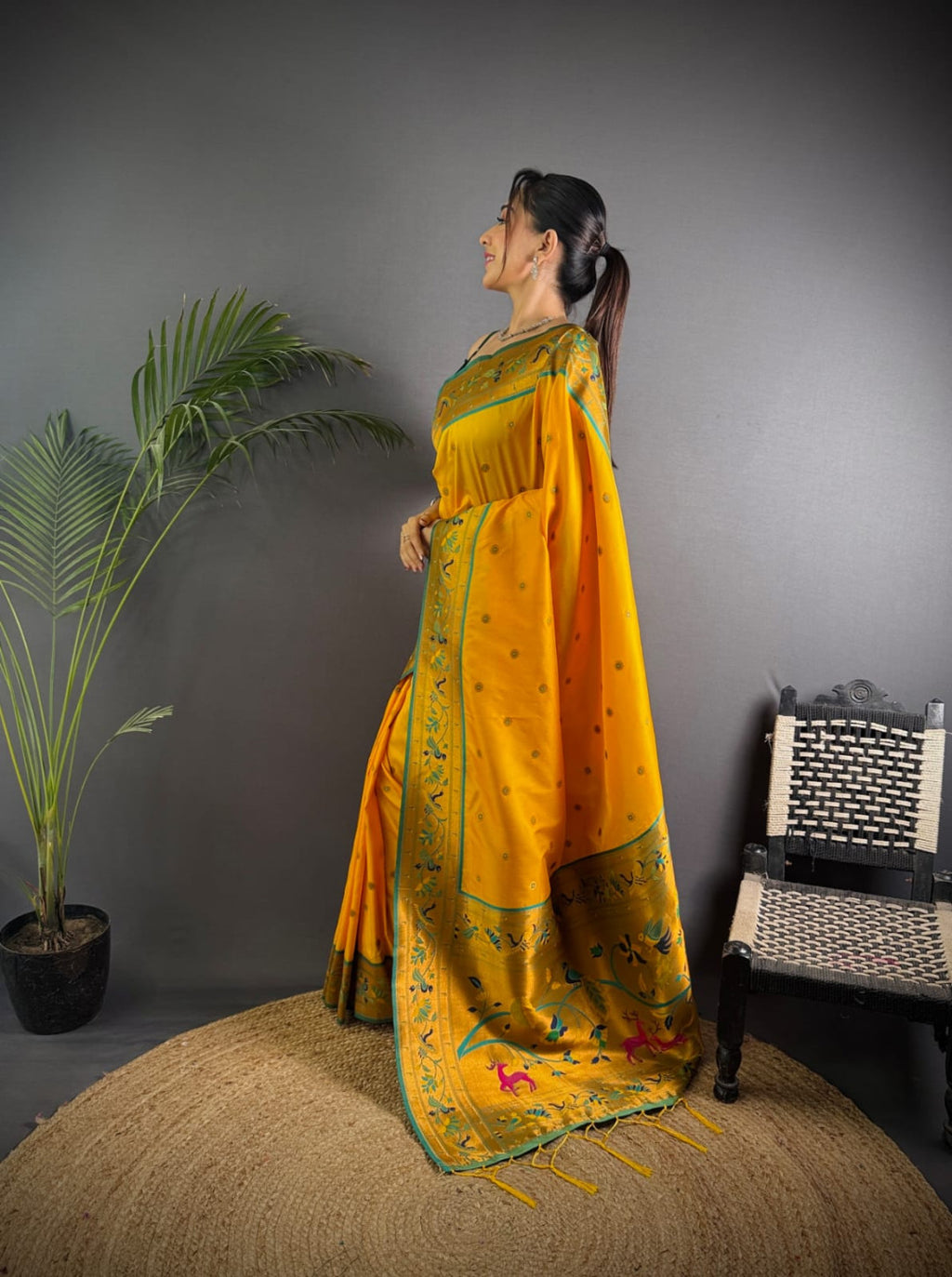 Yellow colour paithani silk saree with zari weaving work
