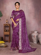 Magenta colour hand bandhej bandhani saree with zari weaving work