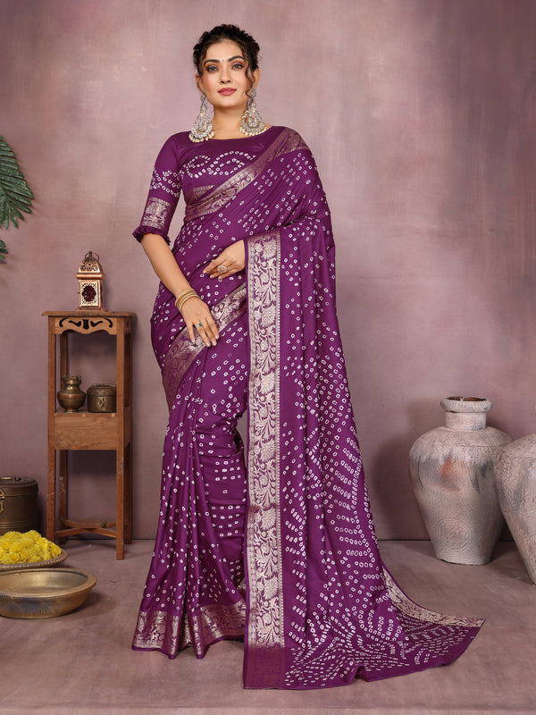 Magenta colour hand bandhej bandhani saree with zari weaving work